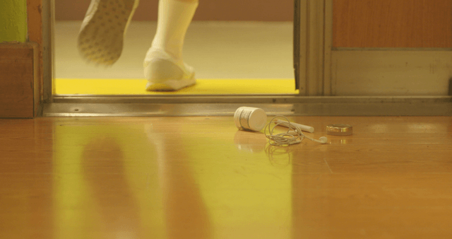 Students running outside with objects scattered in the classroom