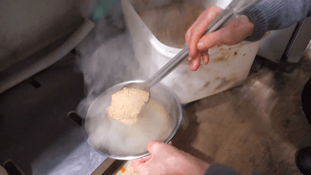 Preparing soybean paste in a kitchen