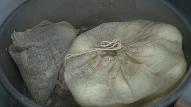 Ingredient pouch in a large pot