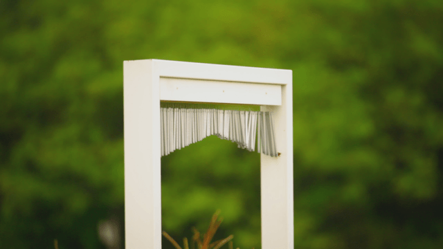 Wind chime in the green forest
