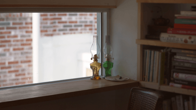 Cozy indoor space with books and lamps