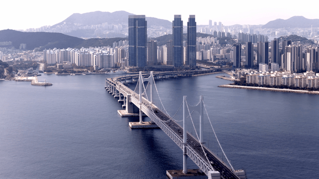 Marine cityscape with a bustling grand bridge