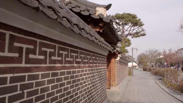 Traditional tiled wall and street scene