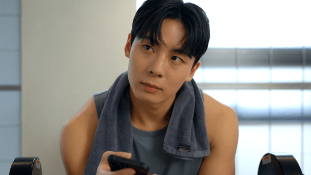 Man resting during workout and looking into distance