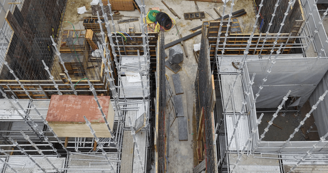 Construction site with scaffolding and materials