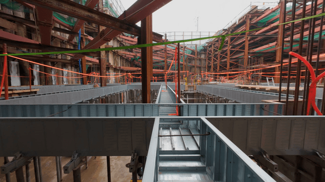 Construction site with metal beams and scaffolding