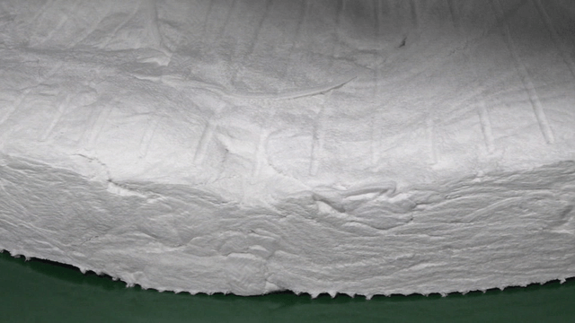 Close-up of industrial white fabric stacks