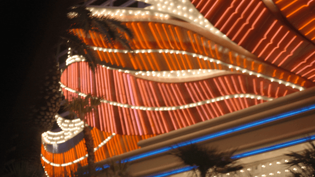 Neon lights on a city building at night