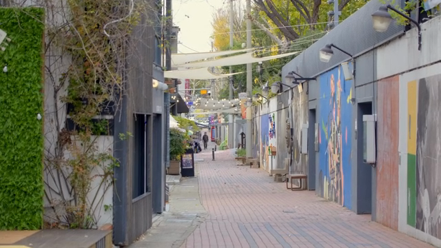 Quiet alley with colorful murals