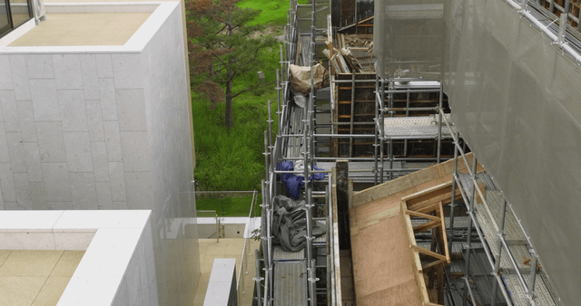 Building under construction with scaffolding