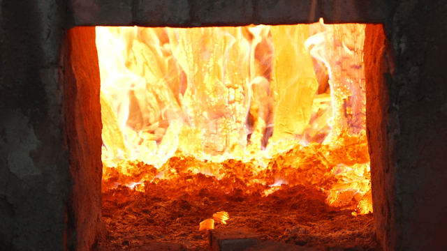 Charcoal kiln with blazing flames