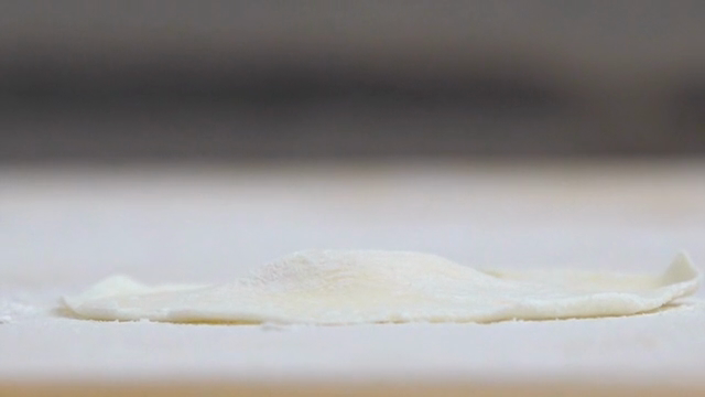 Dumpling dough on a floured surface