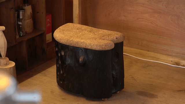 Uniquely designed wooden chair in interior space