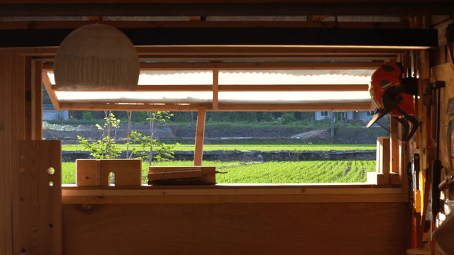 Wood workshop with farm view through the window