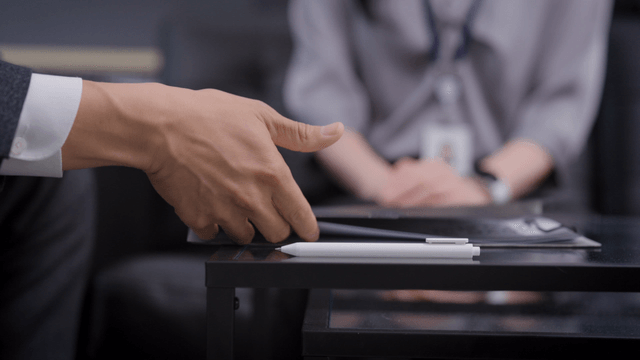 Businessman signing documents