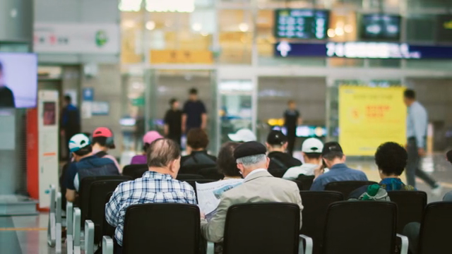 People waiting in an train terminal