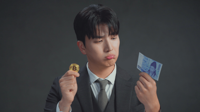 Man holding bitcoin and Korean won