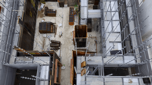 Construction site with scaffolding and materials