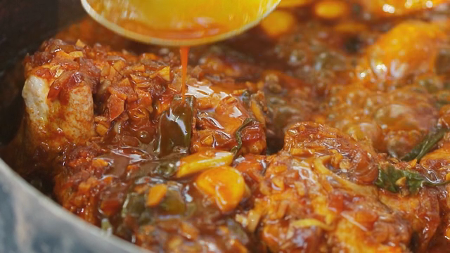Simmering stew with rich sauce and vegetables