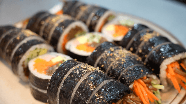 Delicious kimbap rolls on a plate