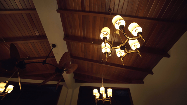 Warm lighting in a wooden ceiling room