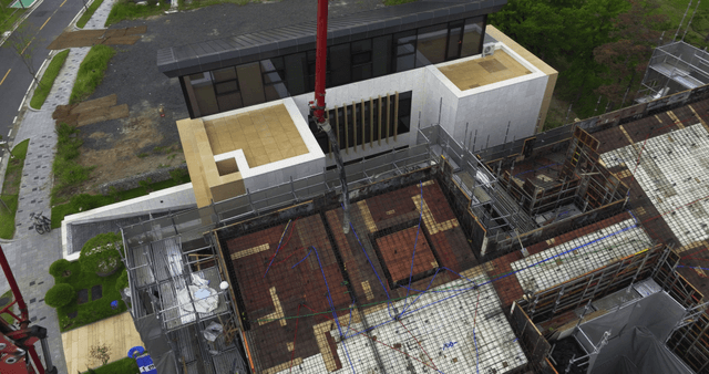 Construction site with concrete pump