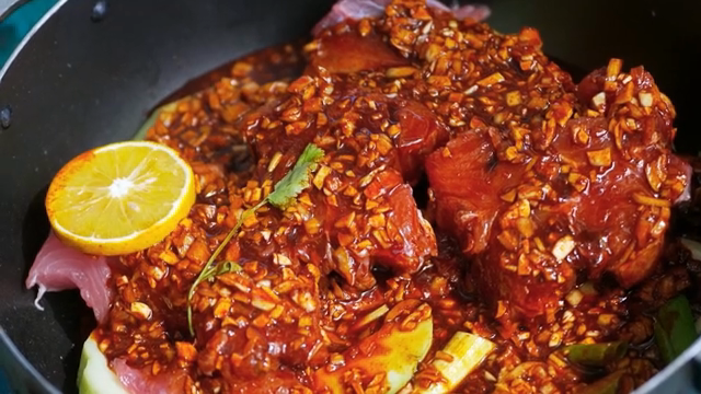 Meat marinating with spices and lemon