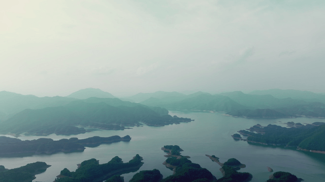 Tranquil lake surrounded by mountains