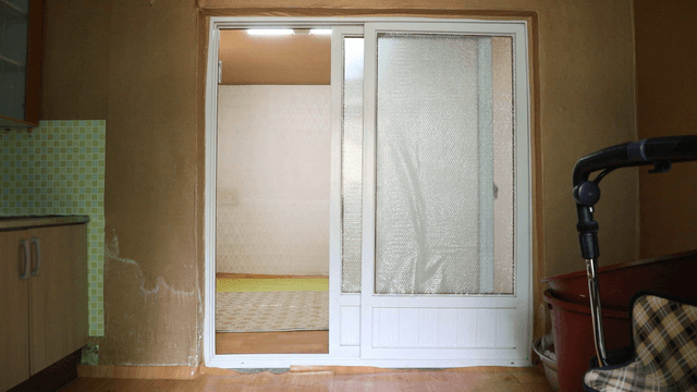 Empty room with a sliding door