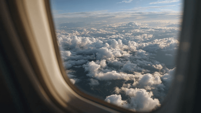 View of clouds from an airplane window