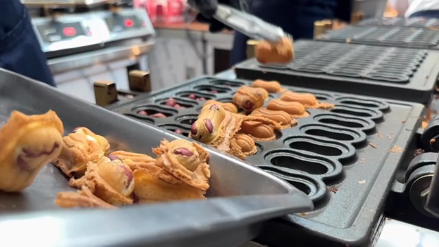 Freshly baked peanut-shaped bread