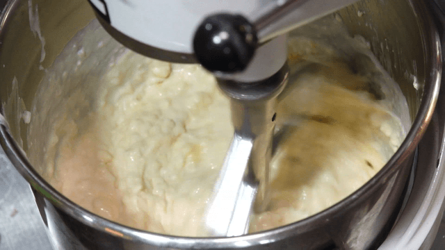 Mixer blending ingredients in a kitchen