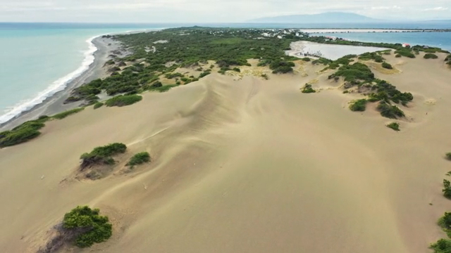 Expansive sand dunes by the sea