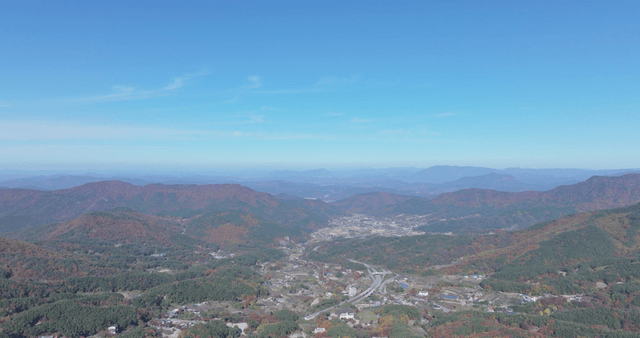 Expansive mountain landscape under clear sky