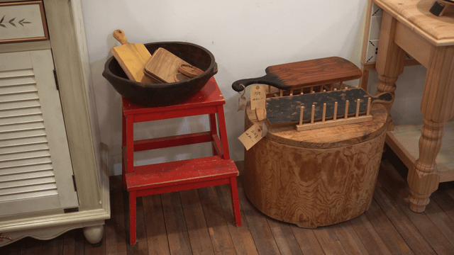 Wooden kitchen tools on display indoors