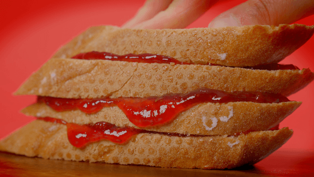 Slices of bread with strawberry jam