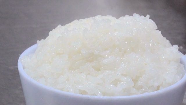 Steaming bowl of freshly cooked rice
