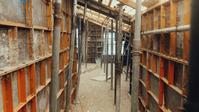 Inside a construction site with scaffolding