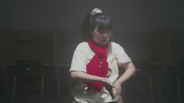 Girl dancing passionately in the reading room