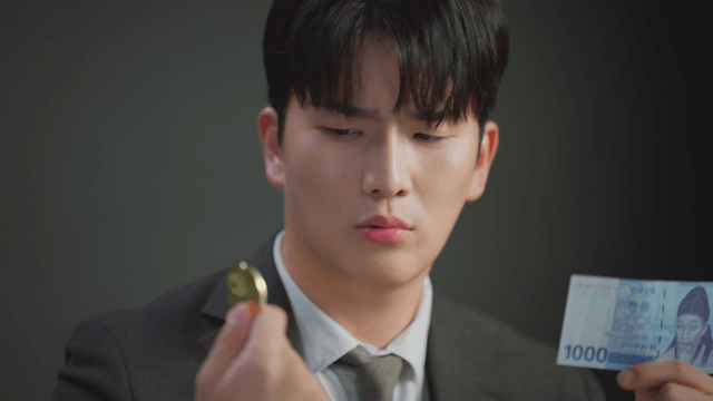 Man comparing bitcoin and Korean won
