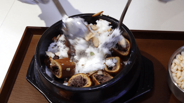 Bingsu mixed with red bean bun and various toppings