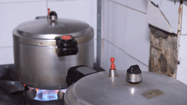 Pressure cookers on a gas stove
