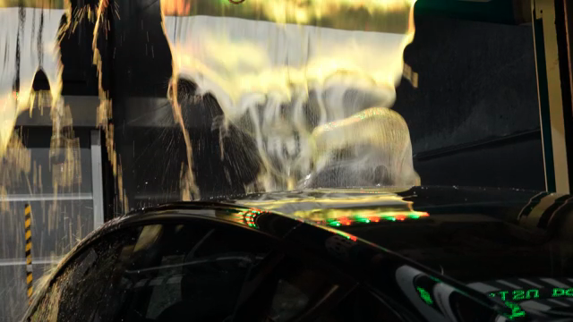 Car wash with colorful soap foam