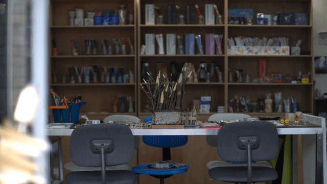 Wooden branch pencil sculpture on art activity table