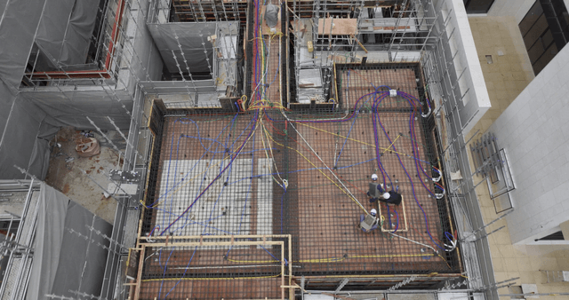 Construction site with scaffolding and workers