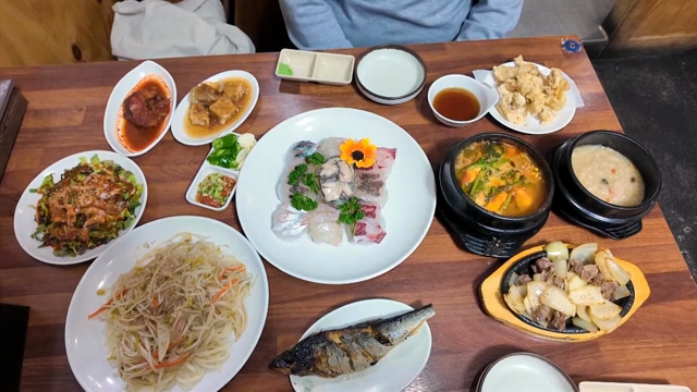 A variety of Korean dishes on a table