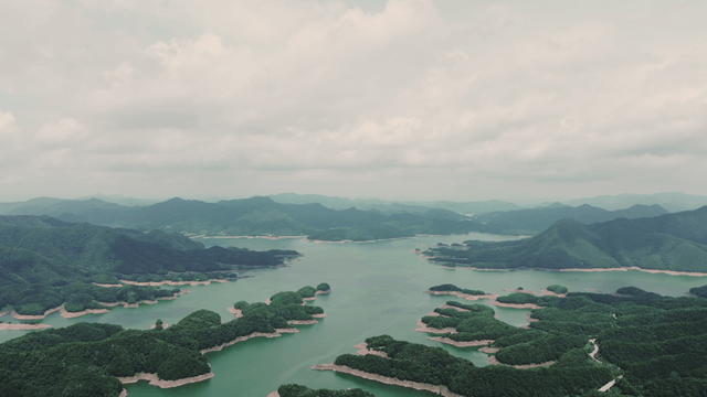 Vast lake surrounded by lush mountains