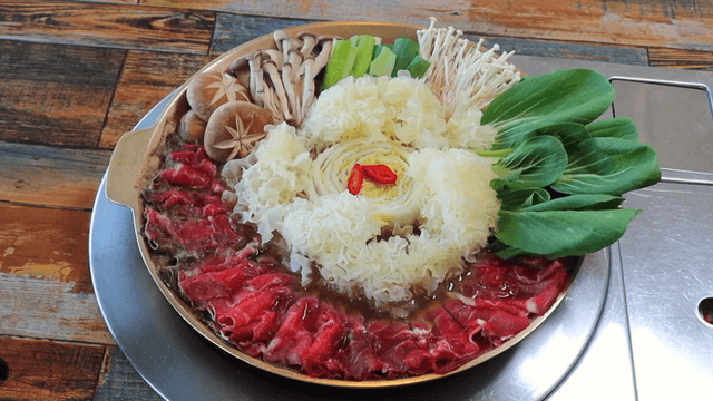Hot pot being cooked in a pot
