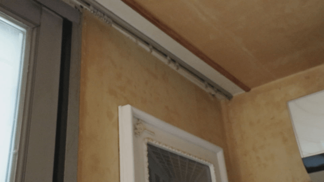 Interior view of a window and wall corner