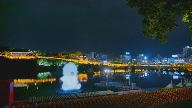 Night view with illuminated traditional pavilion